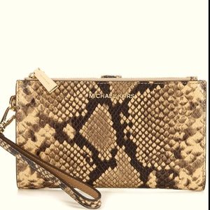 Micheal Kors “snakeskin” wristlet/ clutch bag